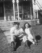 1817 Deyo House with Concetta and friend and neighbor, Mike Yess, chatting on the lawn. 1946.
