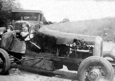 Mary Ann Piskur sits in her uncle's race car, circa 1937. The car ran at many tracks including some in Ulster, Orange, and Dutchess Counties.